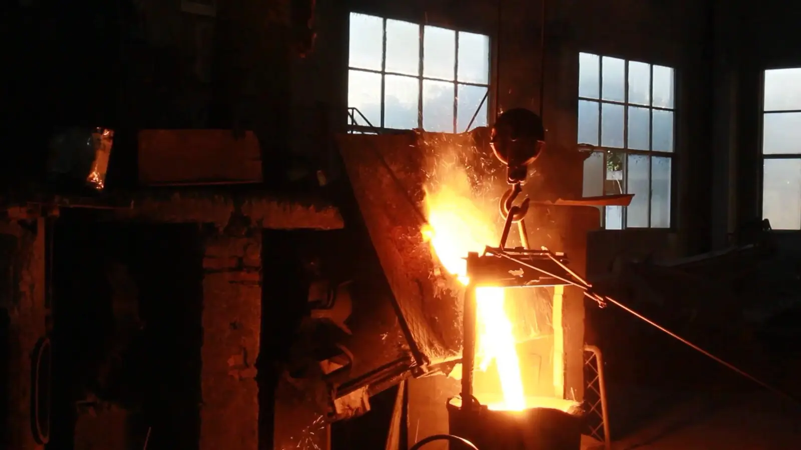 Pouring metal into moulds